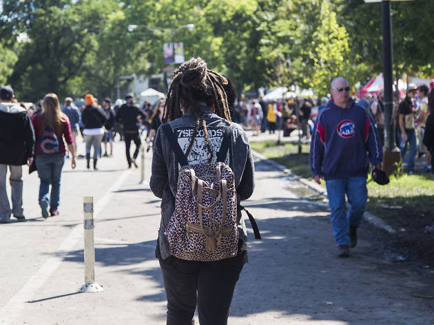 Crowds trudged through muddy fields during the second day of Riot Fest, September 12, 2015.