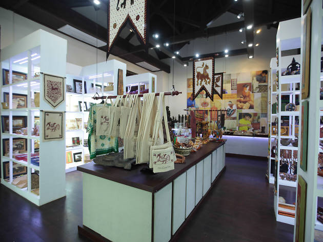 Pick up a souvenir or gift Pick up a souvenir or gift