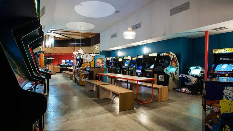 Grab a bite and play arcade games at Button Mash