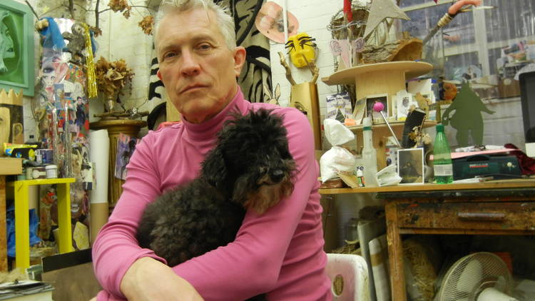 David Harrison in his studio with Harrison, the Toy Poodle