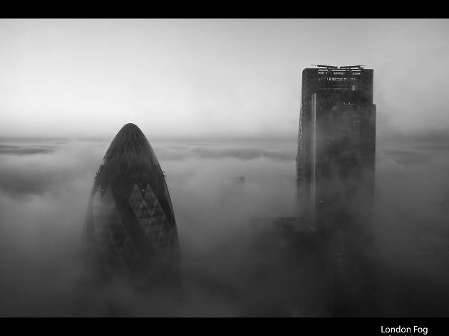 The Gherkin and The Cheesegrater on a misty London morning. The Gherkin and The Cheesegrater on a misty London morning.