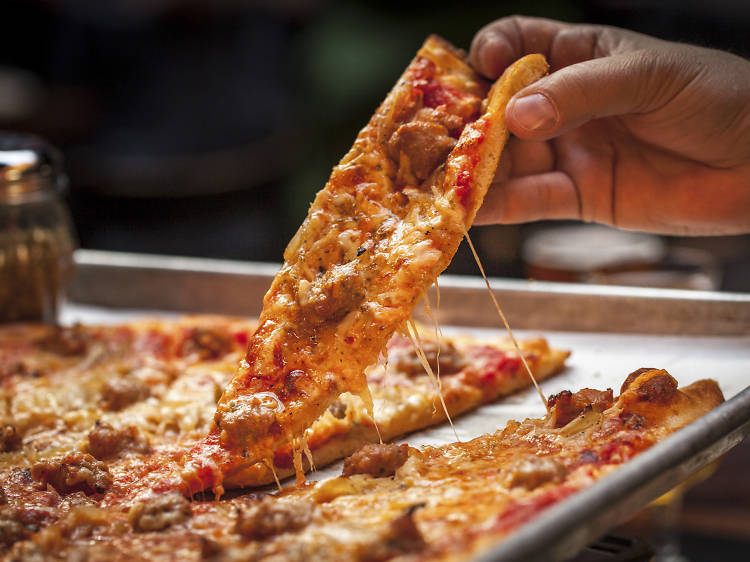 4 Reasons You and Your Friends Should Enjoy a Slice of Pizza — Top in Town  Pizza