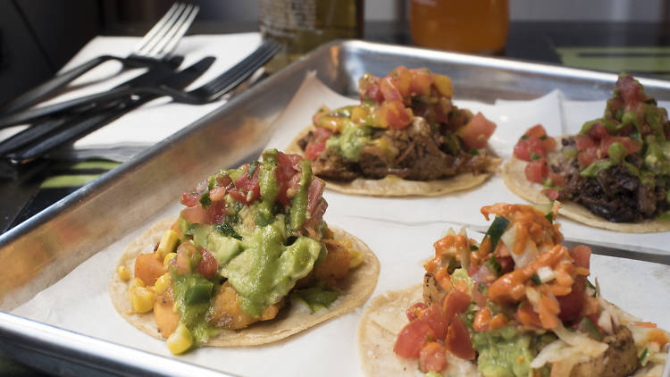 Tray of tacos - brisket, fish, vegetable (butternut squash) and carnitas