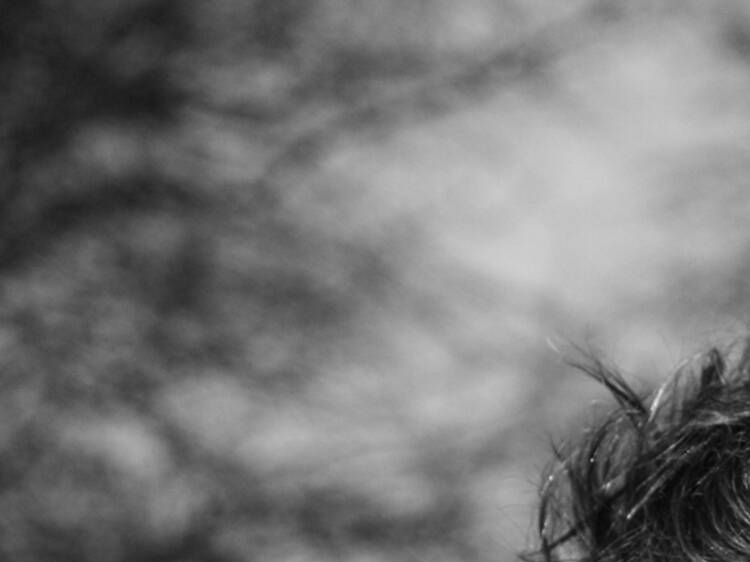 A black-and-white profile picture of Irish comedian Dylan Moran