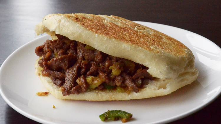 Flatbread filled with cumin lamb.