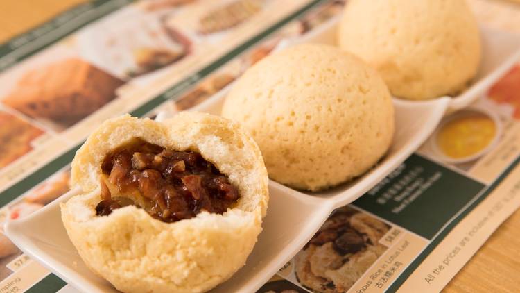 A shot of three baked buns with BBQ Pork at Tim Ho Wan