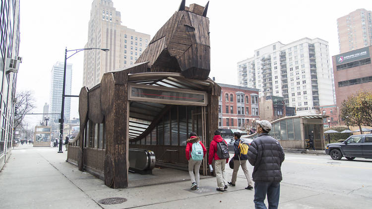 The Field Museum's Trojan Horse sits atop an entrance to the Chicago Red Line station