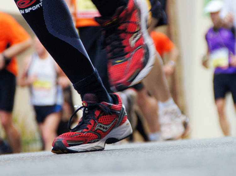 Shoes hitting the pavement in a race