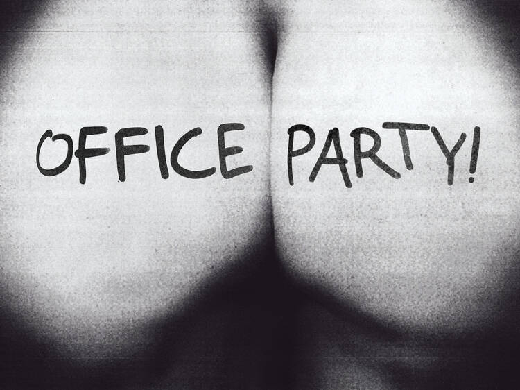 A pair of buttocks photocopied with the words 'office party' wri