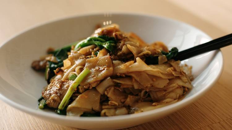 Pork pad siew at Chat Thai Pork pad siew with a pair of chopsticks