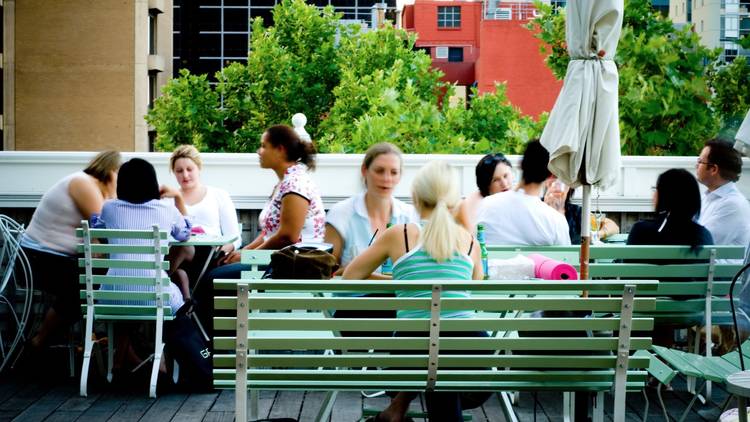 A shot of the rooftop area at Madame Brussels showing a group of