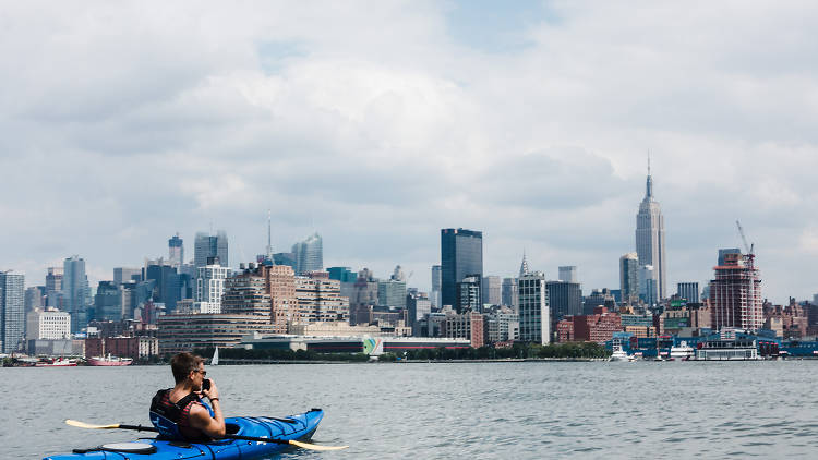 Snapping a shot of the Empire State Building from a kayak