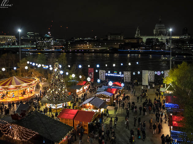 A Christmas fair taking place between Tate Modern and the River Thames. A Christmas fair taking place between Tate Modern and the River Thames.
