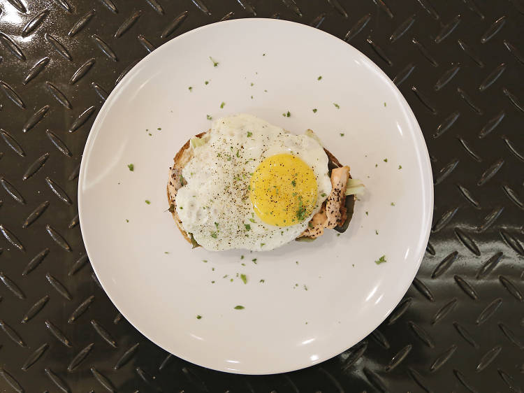 Toast + grilled salmon croque madame + cream cheese + sunny-side-up at Shucked