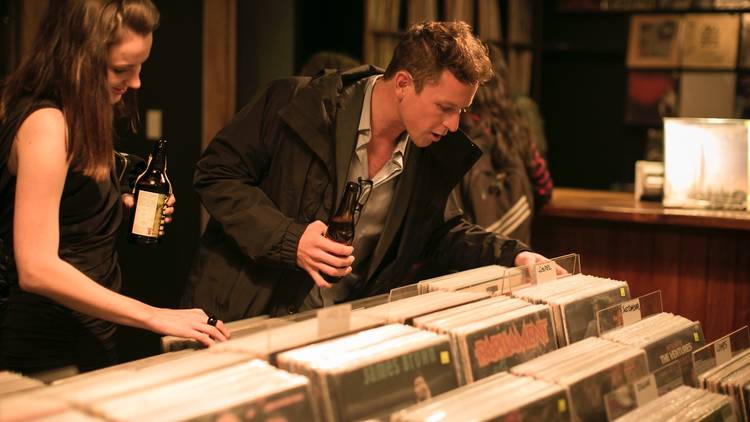 Couple looking through records