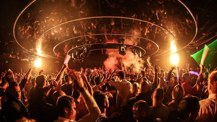 People dancing in a busy nightclub