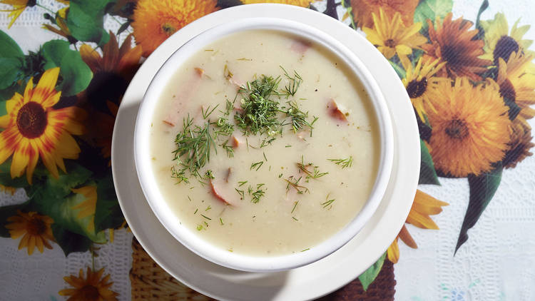 A bowl of sour borscht soup.