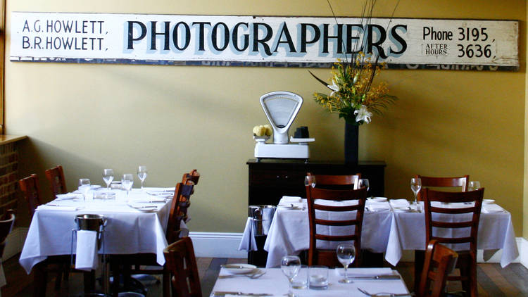 Tables are set ready for diners to arrive