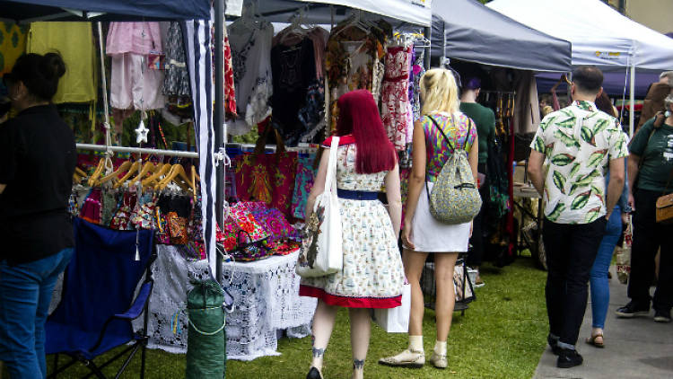 Attendees check out the stalls at the Rock 'n' Roll & Alternative Market