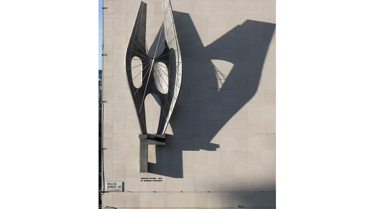 Barbara Hepworth: 'Winged Figure', 1963, on the side of John Lewis, Oxford Street. © Historic England