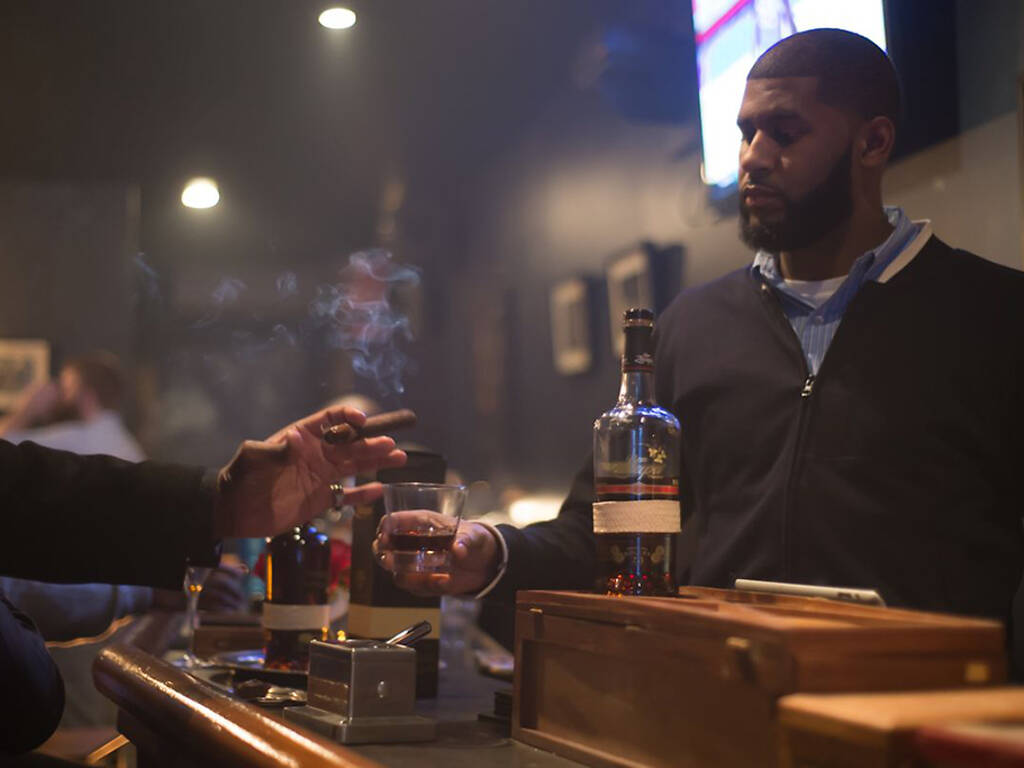 Find a cigar bar in NYC for the best smokes while lounging