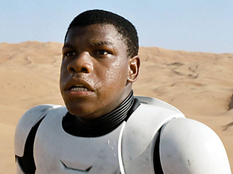 Actor John Boyega playing a stormtrooper in Star Wars: The Force Awakens