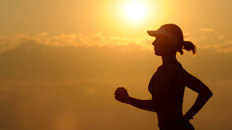 Silhouette of woman running