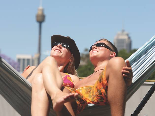 Two people on Glebe YHA rooftop Two people on Glebe YHA rooftop