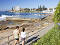 Walkers on the foreshore of Cronulla beach