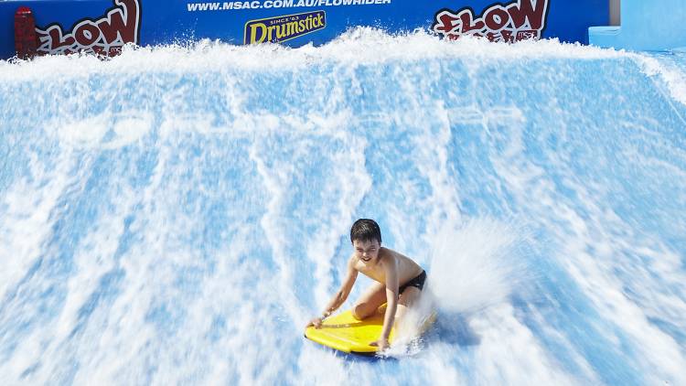 Catch a gnarly wave on a surfing simulator