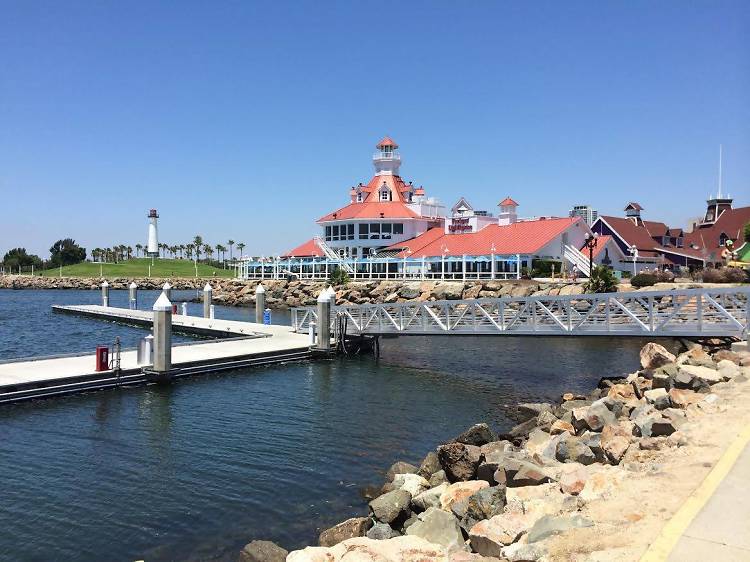 Stroll along Rainbow Harbor and Shoreline Village