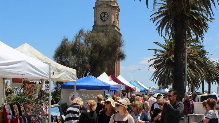 Shoppers browse stalls at the The Esplanade Market in St Kilda