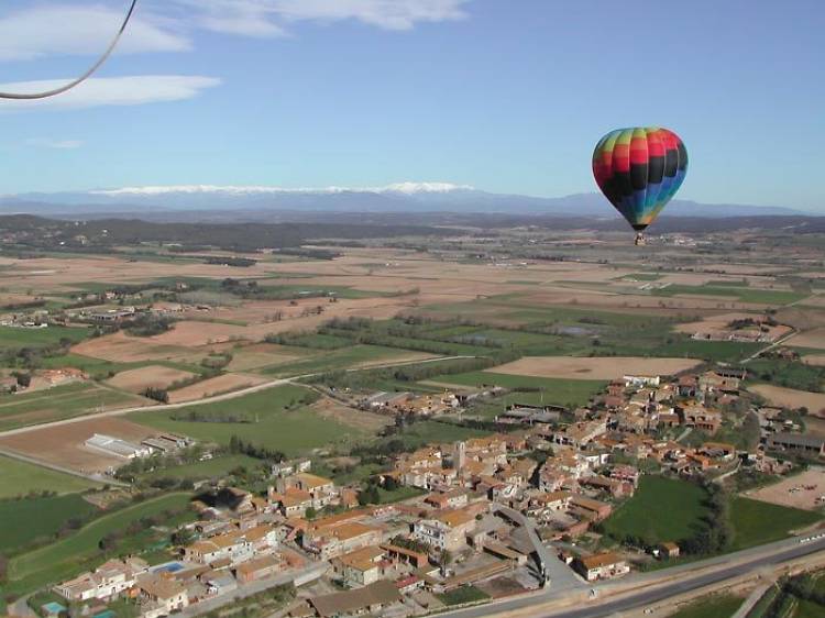 Fly over the city in a hot air balloon