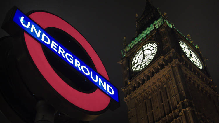 London Underground sign at night