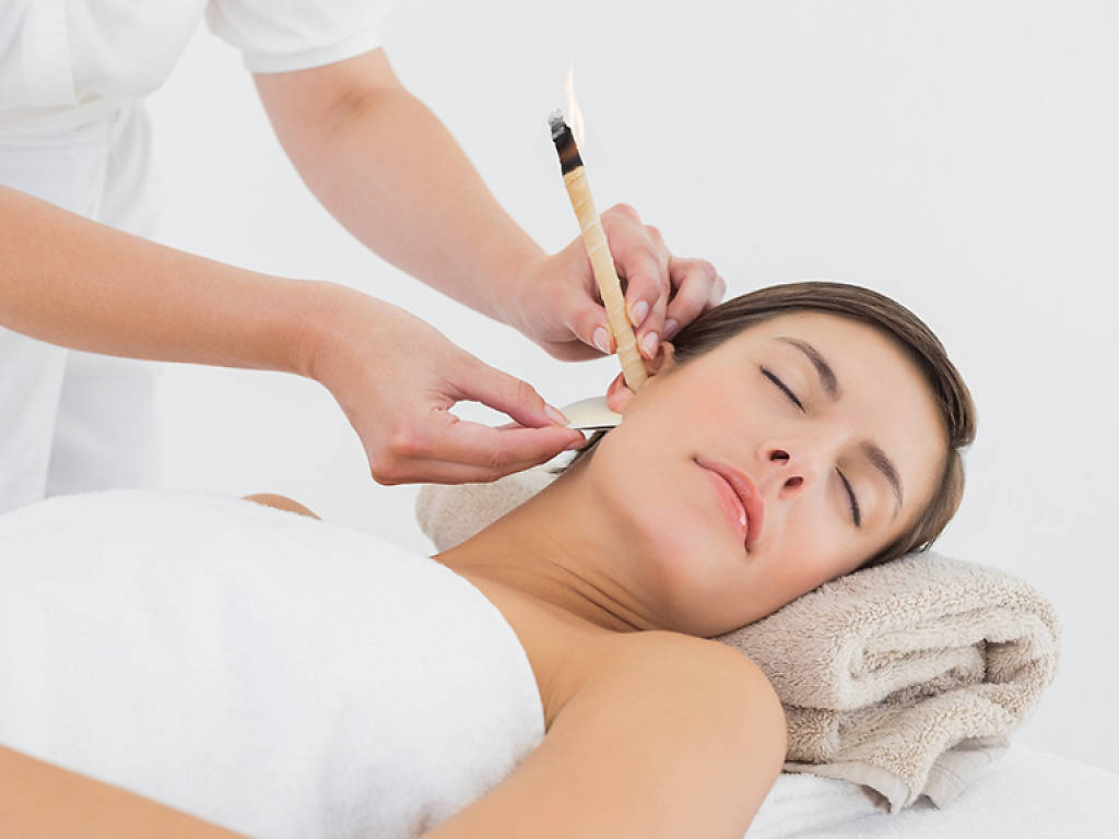 Ear candling treatments at spas and salons in New York