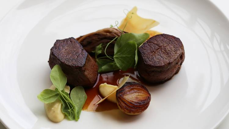 Beef fillet with charred onion, shallot puree and jus at Meat Fish Wine