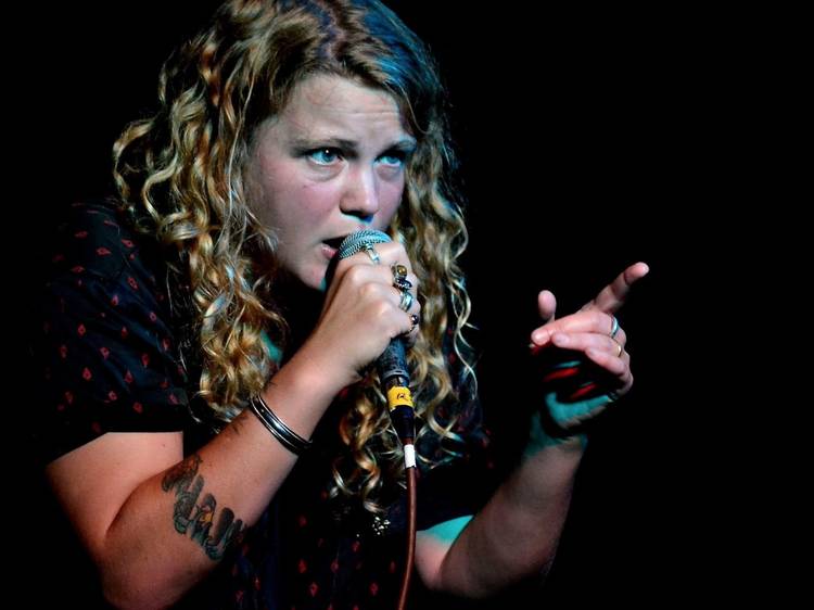 Kate Tempest performing on stage