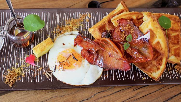 waffle, egg, bacon and syrup