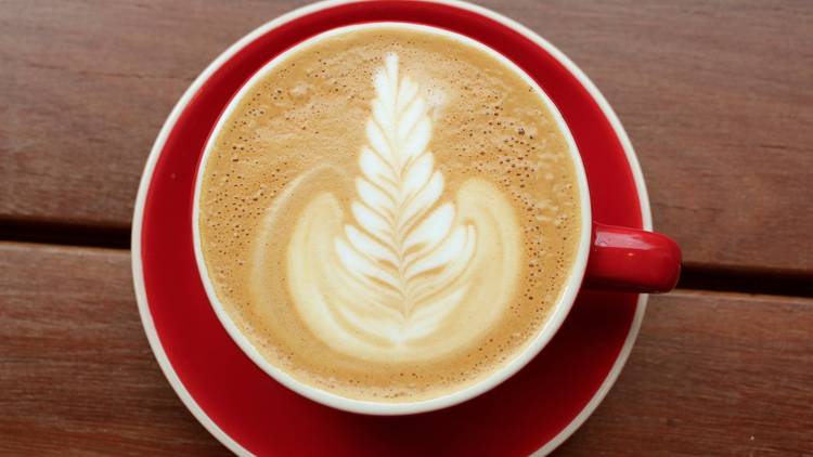 coffee on a red plate