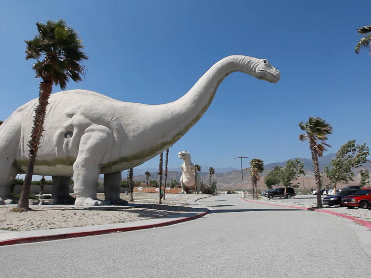 Pose in front of the Cabazon Dinosaurs