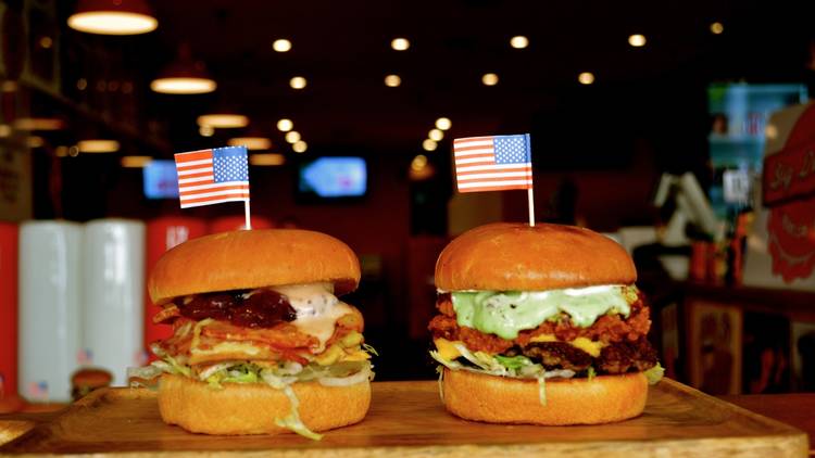 burgers with american flags stuck in them