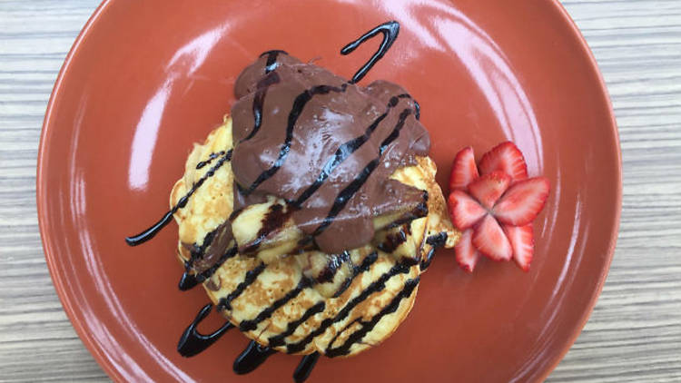 pancakes with chocolate and strawberries