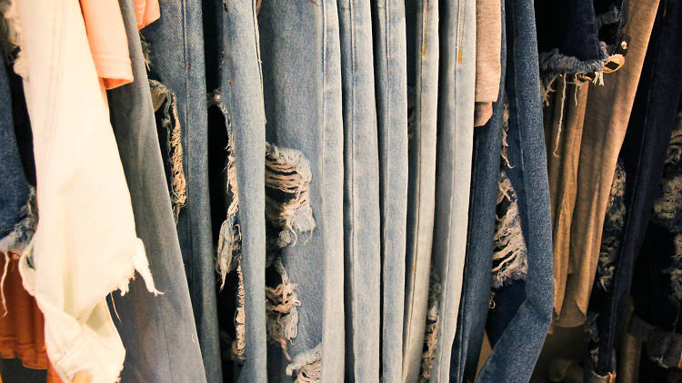a rack of clothes at pony stone