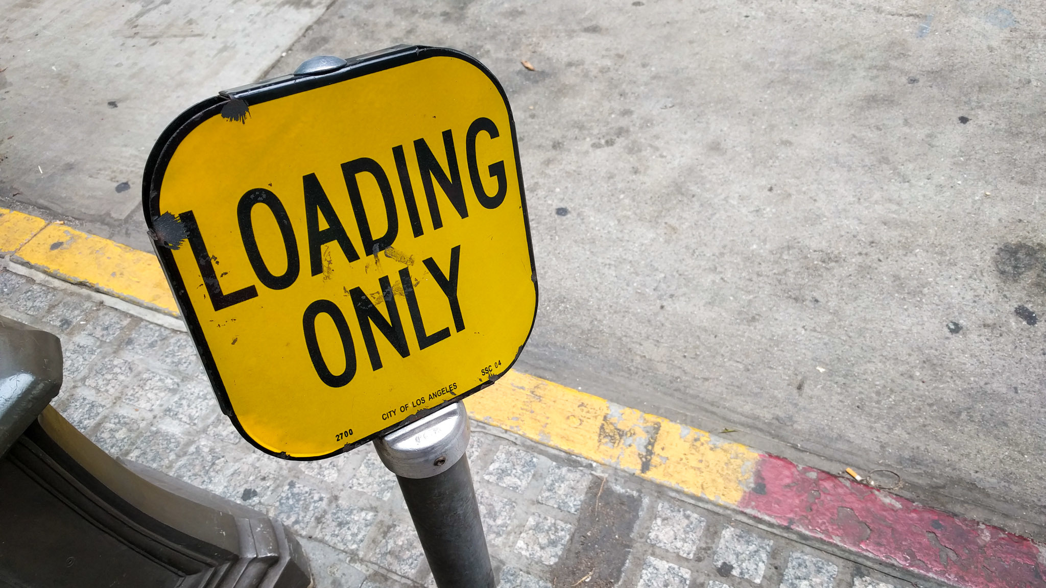 Yellow curb parking loading zone