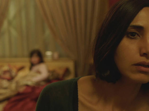 Under the Shadow SFF16 Woman anxiously looks into the distance from inside