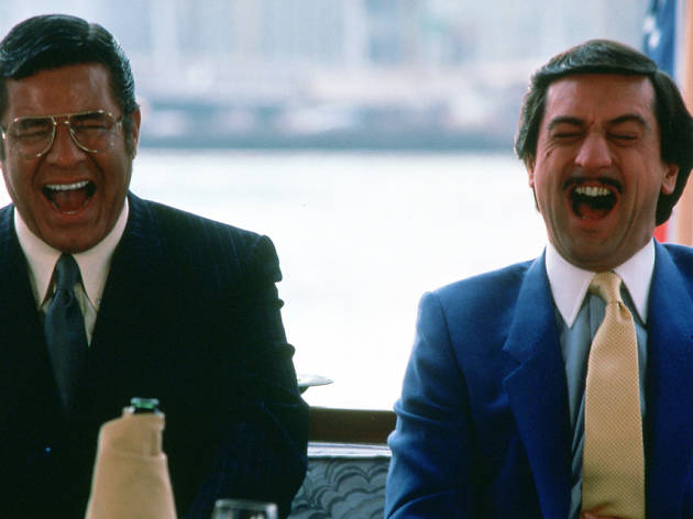 The King of Comedy Two men in suits laughing