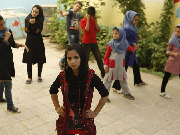 Sonita A group of Afghanian girls standing in a courtyard