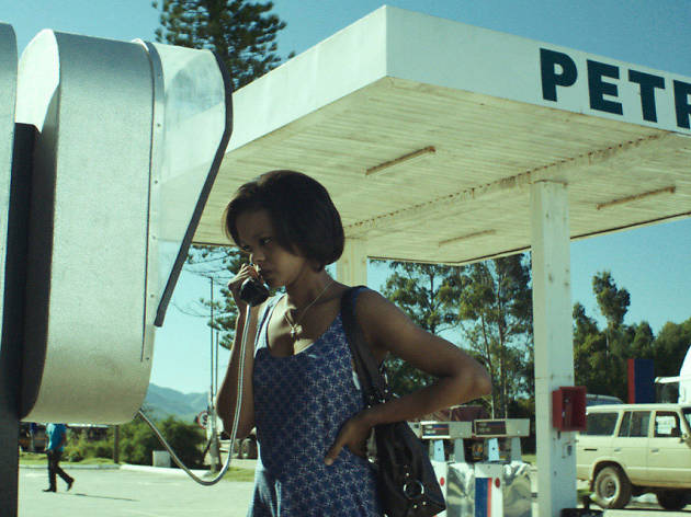 The Endless River A young woman at a payphone in front of a petrol station