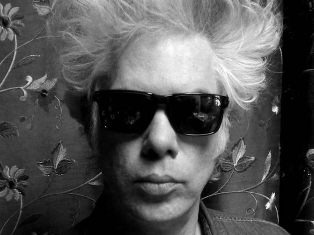 Gimme Danger Rockstar with thick, black-rimmed sunglasses on