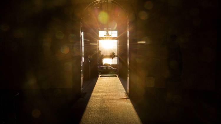Light coming through a door at Elizabeth Bay House